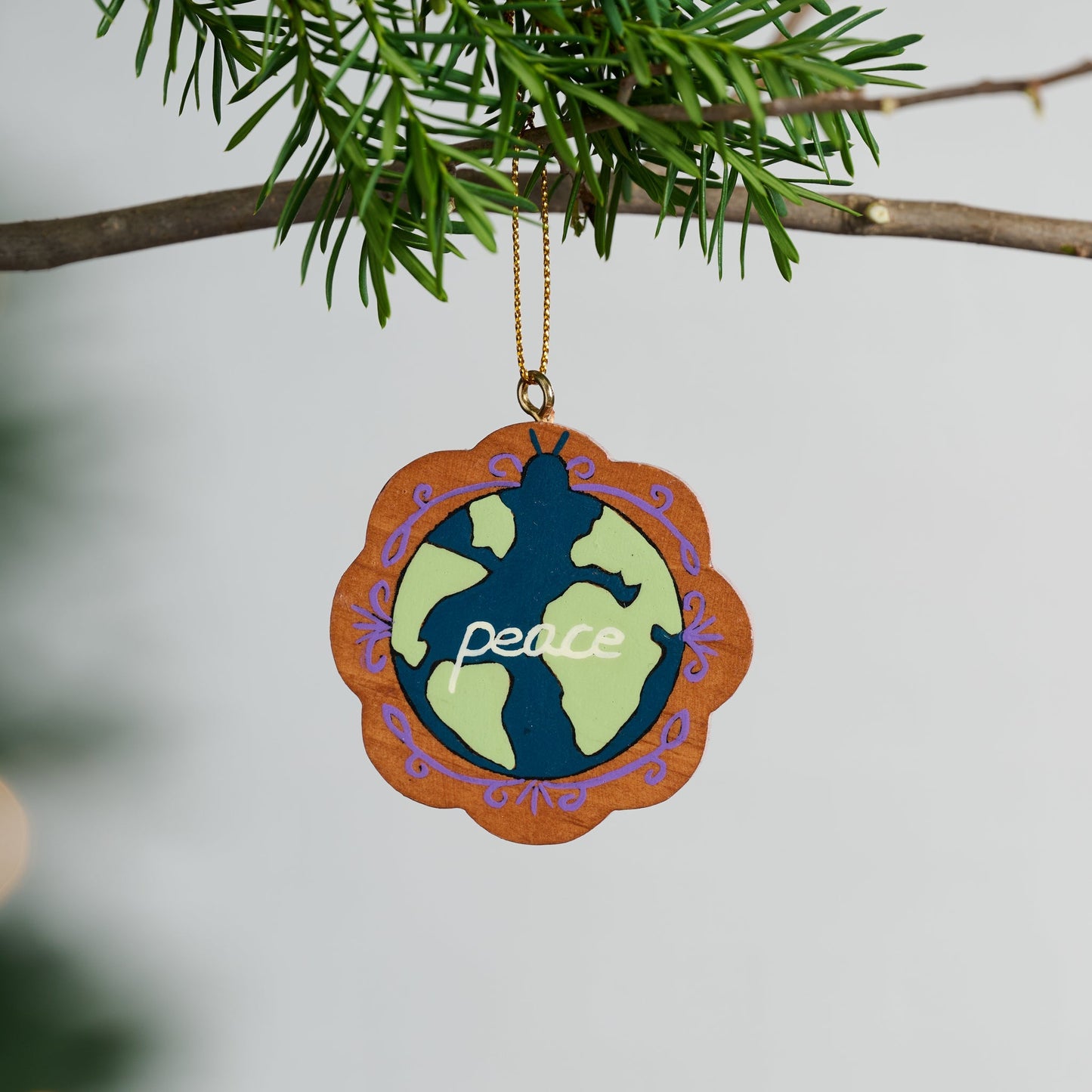 Ornament globe 2024/Peace M/3 wd 2.5D brn/blu/grn