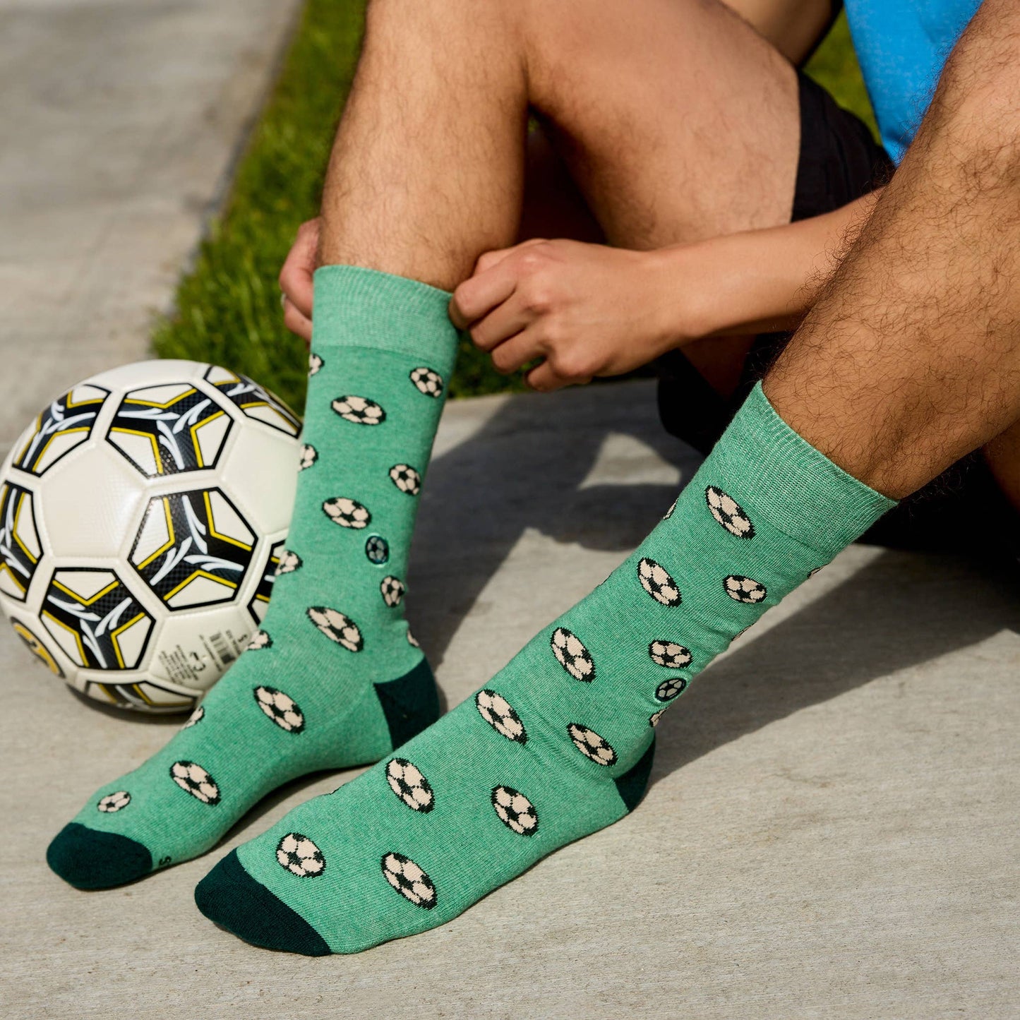 Socks that Support Youth Sports (Green Soccer Balls)
