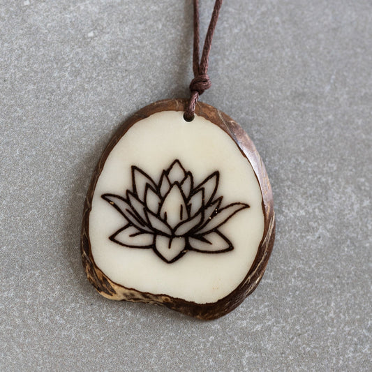 Necklace lotus pendant tagua/cord 16L nat/brn