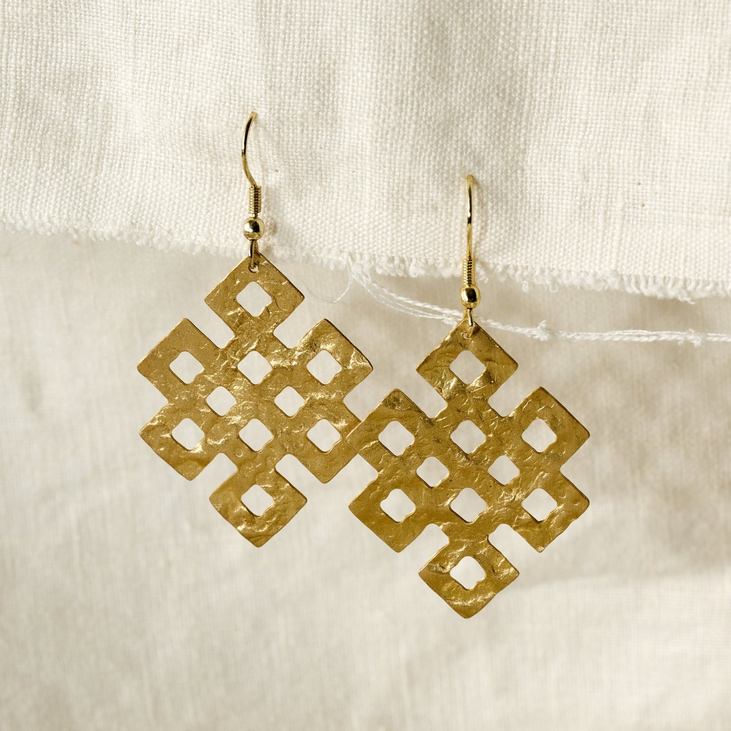 Earrings endless knot hammered brass 2.25L gold