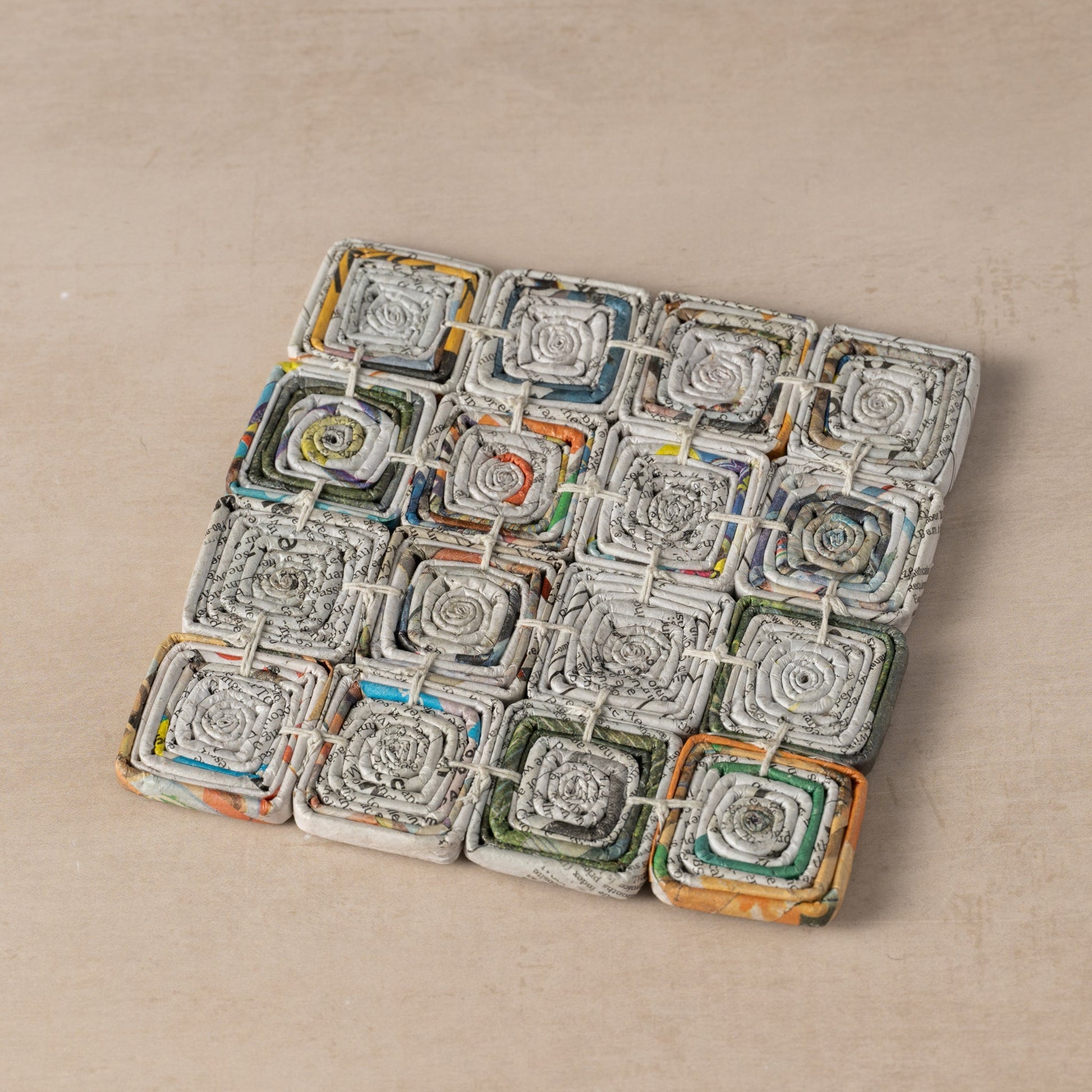Read All About It Recycled Newspaper Trivet - Ten Thousand Villages