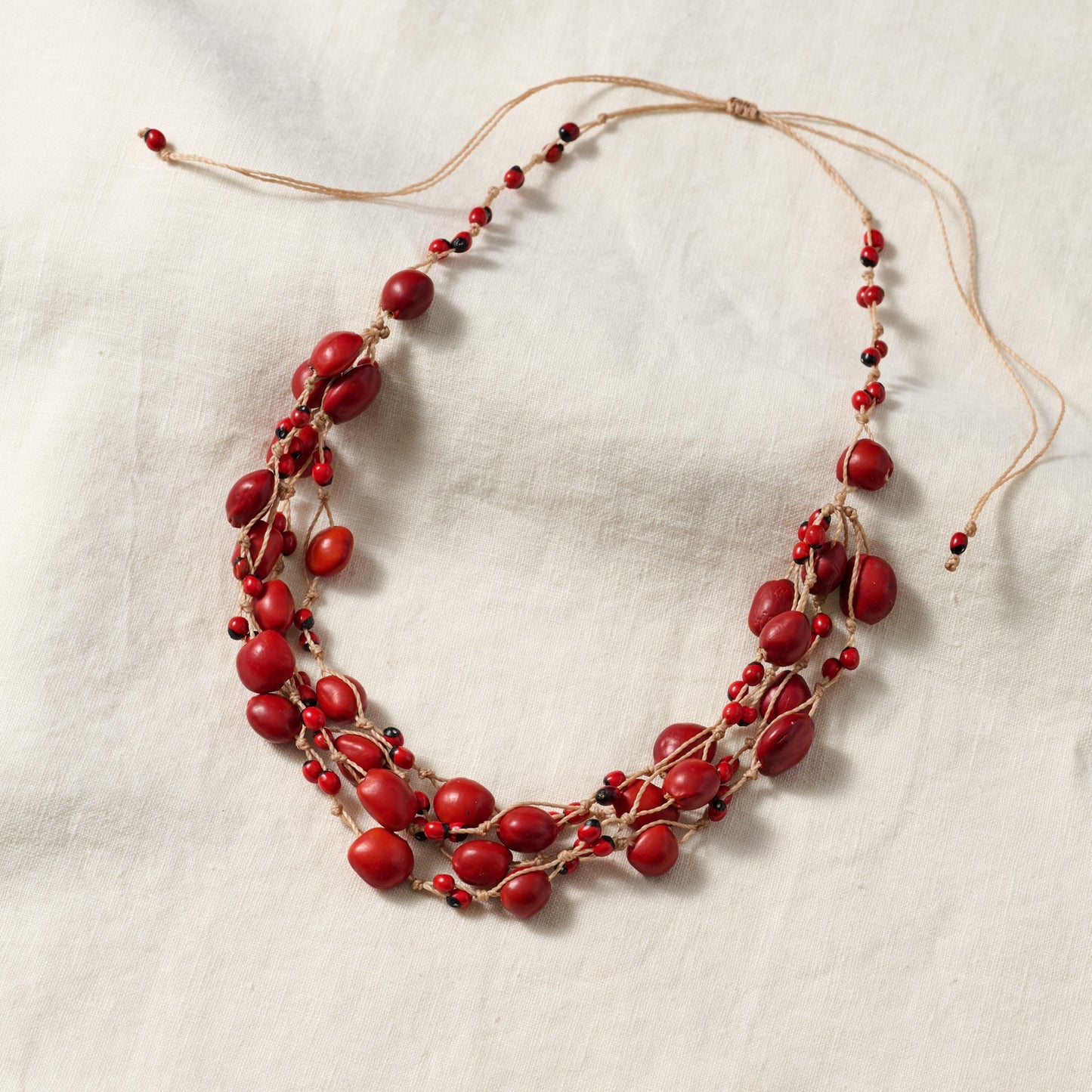 Necklace multistrand seeds/cord adj red/brown