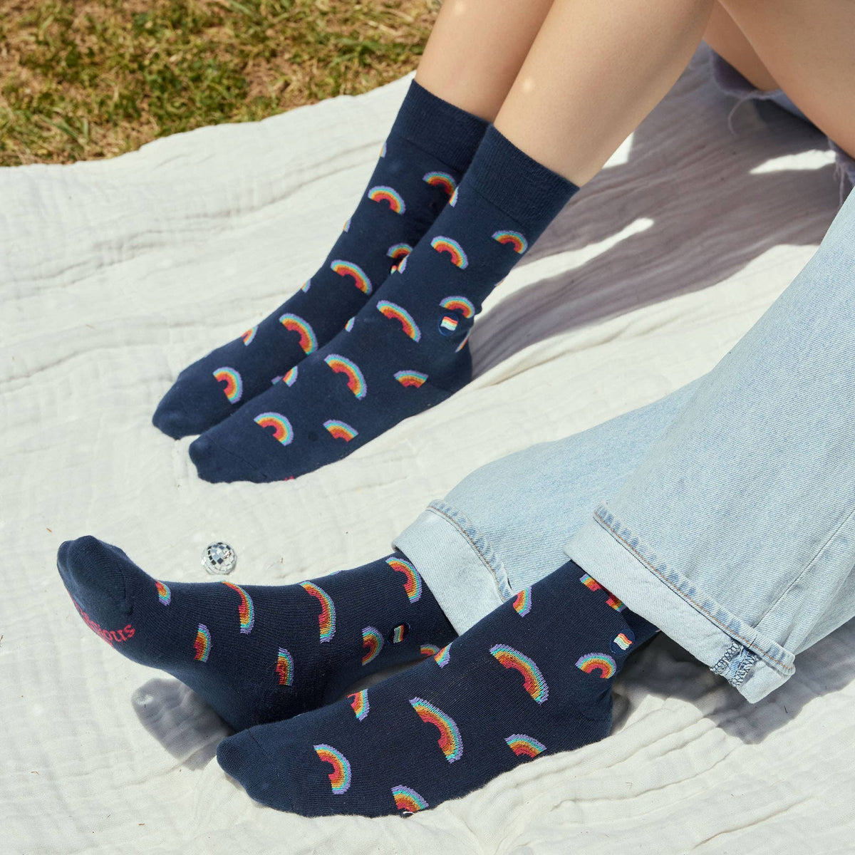 Socks that Save LGBTQ Lives | Navy Rainbows